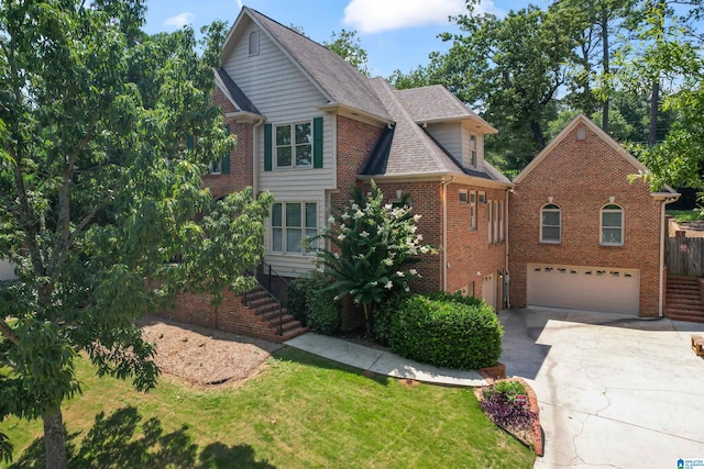 front of property with a garage and a front yard