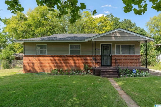 view of front facade with brick siding, a porch, and roof with shingles