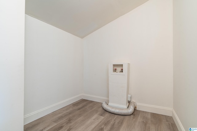 laundry area featuring washer hookup and light hardwood / wood-style flooring