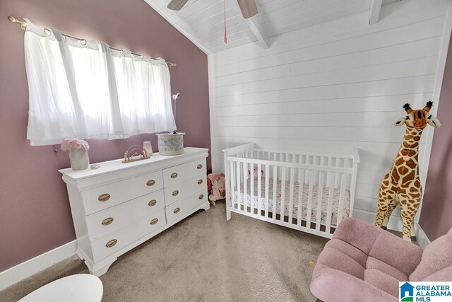 laundry area with washing machine and clothes dryer, cabinets, light tile patterned floors, and wood ceiling