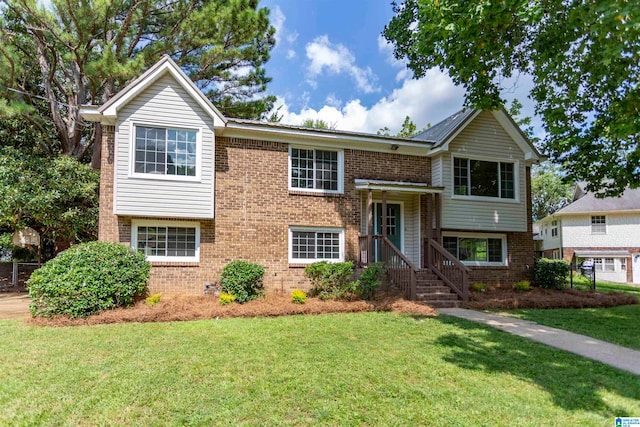 bi-level home with a front yard