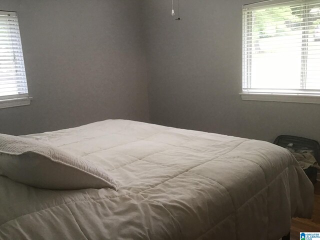 spare room with dark wood-type flooring