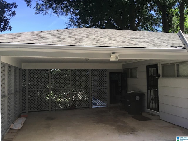 garage featuring a carport