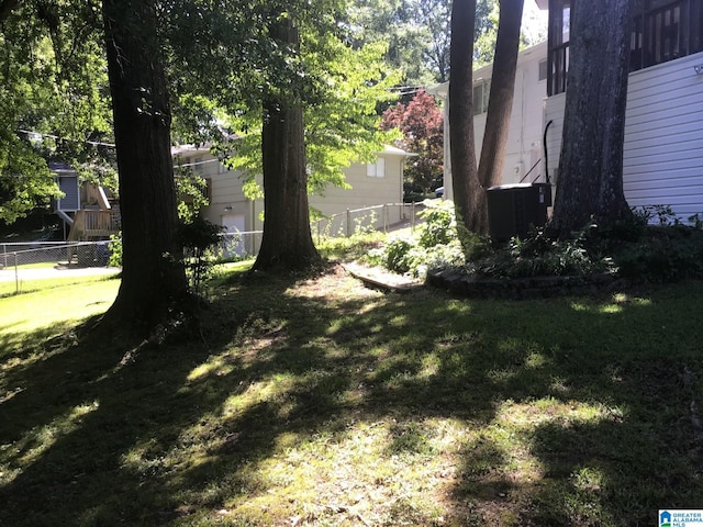 view of yard with central air condition unit