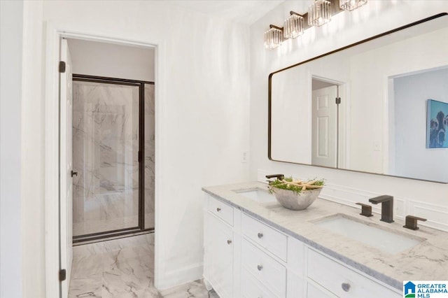 bathroom with walk in shower and vanity