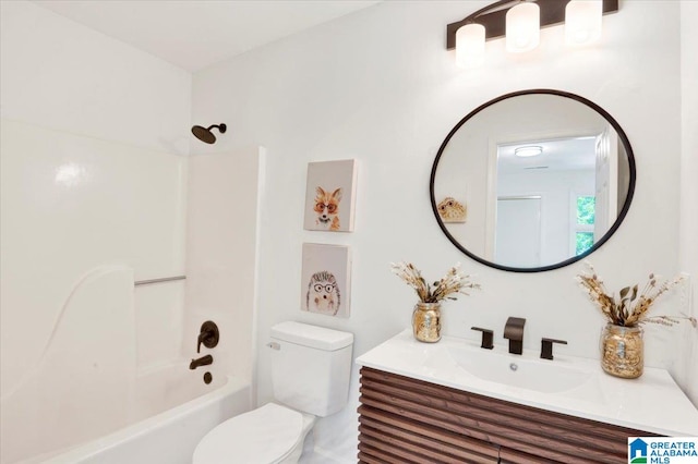 full bathroom featuring vanity, toilet, and shower / washtub combination