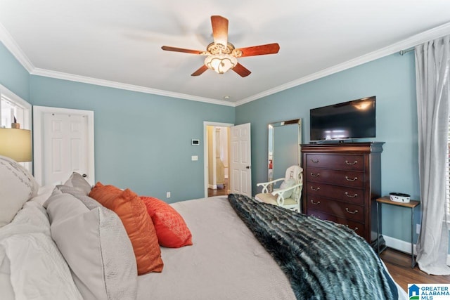 bedroom with ornamental molding, ceiling fan, and hardwood / wood-style floors