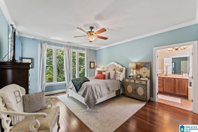 bedroom with dark hardwood / wood-style floors, crown molding, ensuite bathroom, and ceiling fan