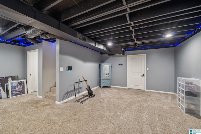 basement featuring carpet flooring