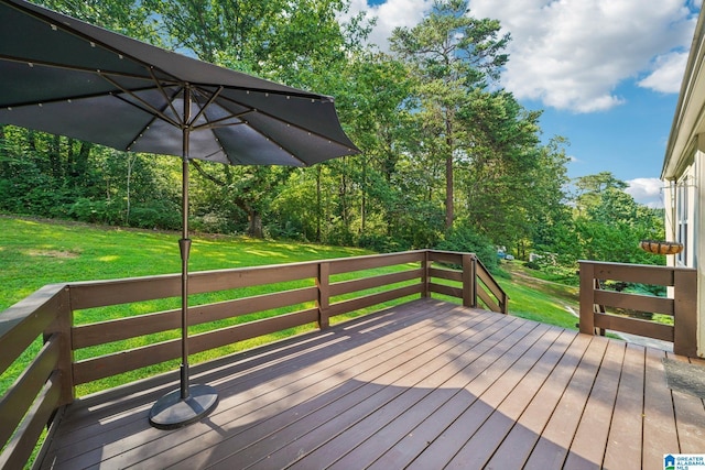 wooden deck with a yard