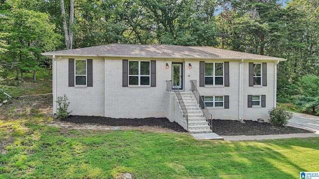 single story home with a front yard