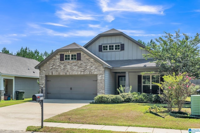 craftsman-style home with a garage and a front lawn