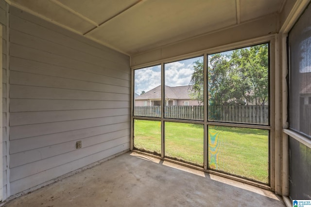 unfurnished sunroom featuring plenty of natural light