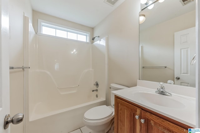 full bathroom featuring  shower combination, tile patterned floors, toilet, and vanity