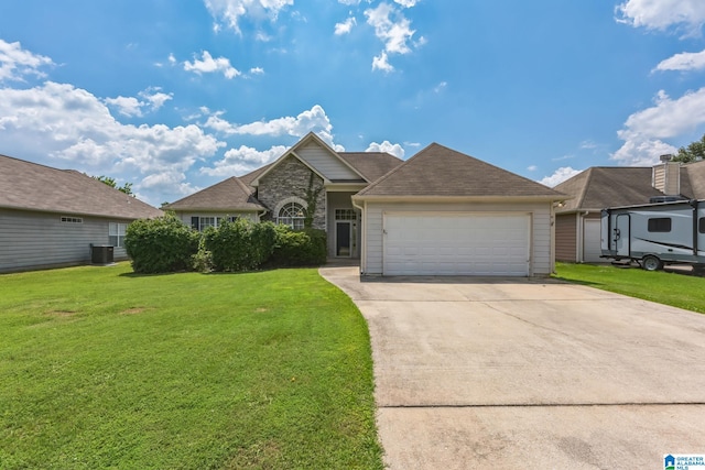 single story home with cooling unit, a garage, and a front lawn