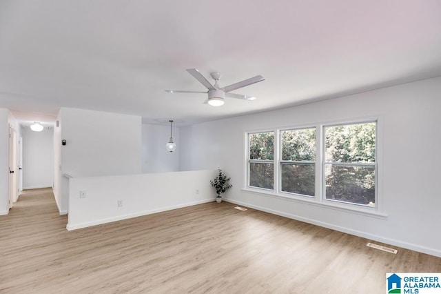 820 Boozer Rd, Heflin, AL 36264 - spare room with wood finished floors, baseboards, and ceiling fan