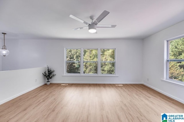 820 Boozer Rd, Heflin, AL 36264 - unfurnished room featuring healthy amount of natural light, wood finished floors, and baseboards