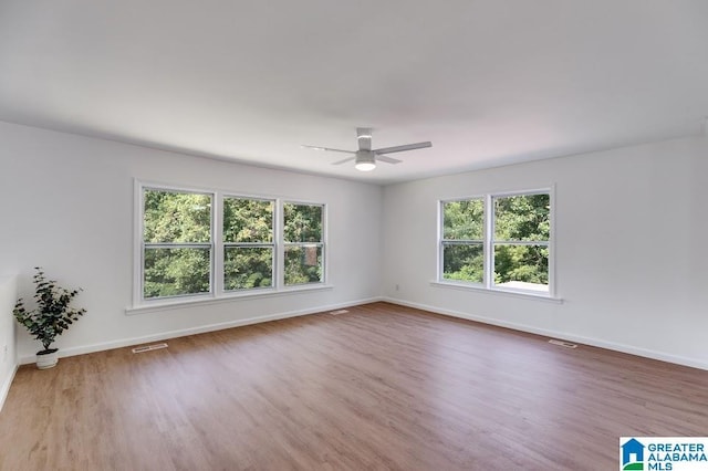 820 Boozer Rd, Heflin, AL 36264 - empty room featuring a ceiling fan, wood finished floors, and baseboards