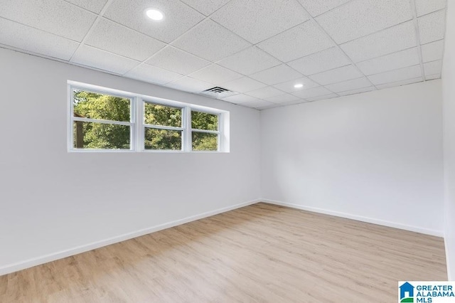 820 Boozer Rd, Heflin, AL 36264 - unfurnished room featuring wood finished floors, a paneled ceiling, baseboards, and recessed lighting