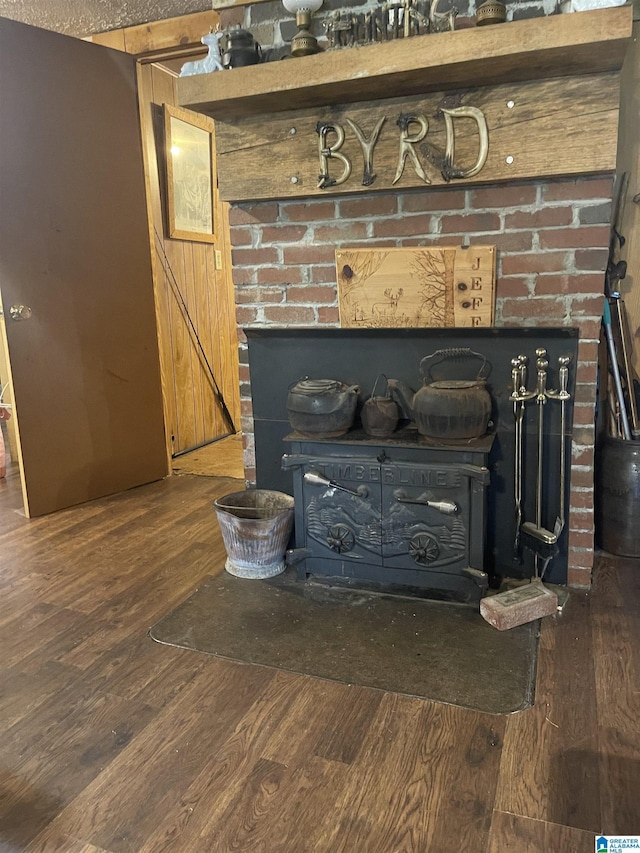 236 Shaw Ln, Sylacauga, AL 35150 - detailed view of wood finished floors and a wood stove