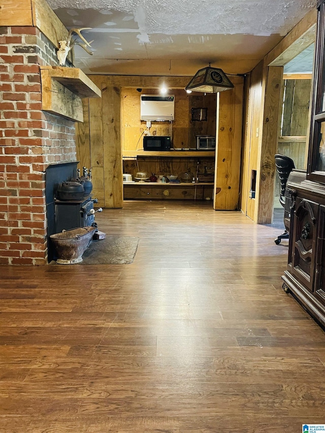 236 Shaw Ln, Sylacauga, AL 35150 - living area with a wood stove and wood finished floors