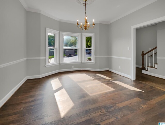 unfurnished room with ceiling fan, a raised ceiling, and hardwood / wood-style flooring