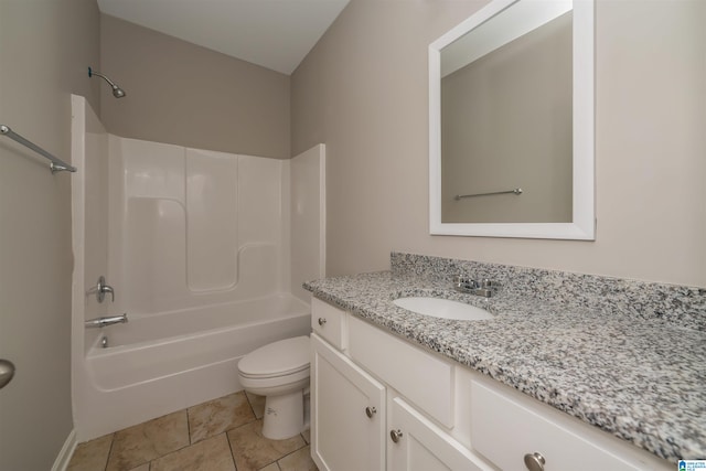 full bathroom with washtub / shower combination, tile patterned flooring, vanity, and toilet