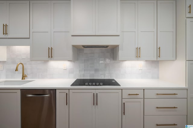 kitchen with black electric cooktop, sink, backsplash, and stainless steel dishwasher