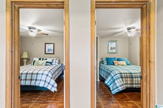 bedroom with tile patterned floors and ceiling fan