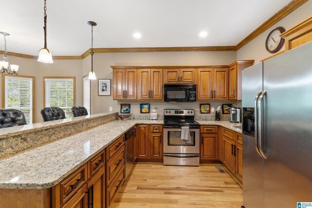 kitchen with kitchen peninsula, light hardwood / wood-style flooring, stainless steel appliances, and pendant lighting