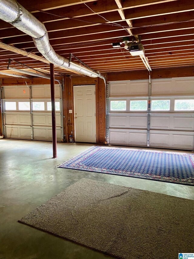 garage featuring a garage door opener