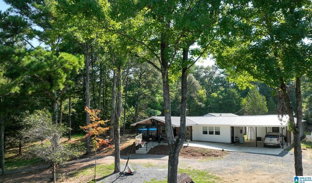 ranch-style home with covered porch