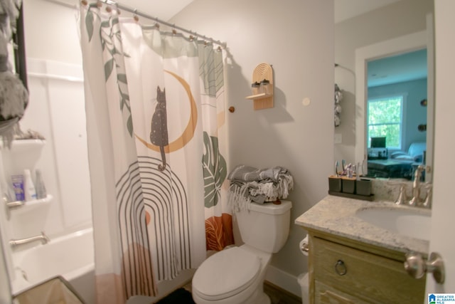 full bathroom featuring toilet, vanity, and shower / bath combo