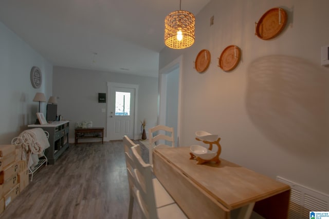 dining area featuring hardwood / wood-style flooring