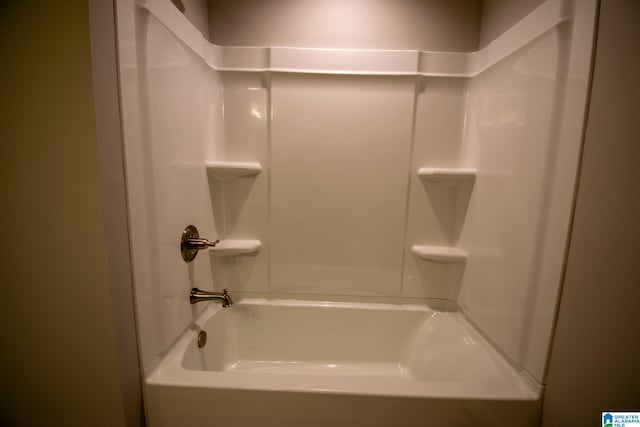 bathroom featuring washtub / shower combination