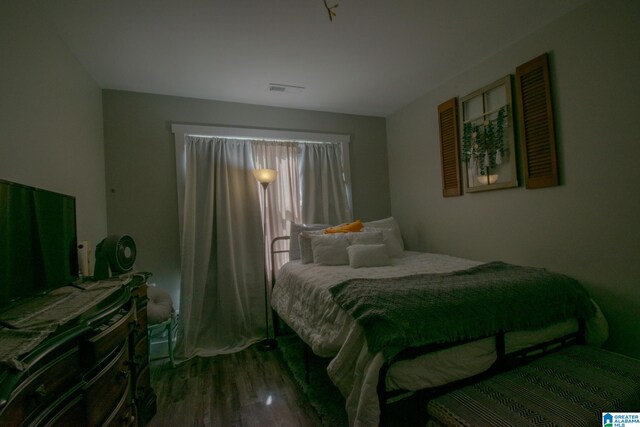 bedroom featuring hardwood / wood-style flooring