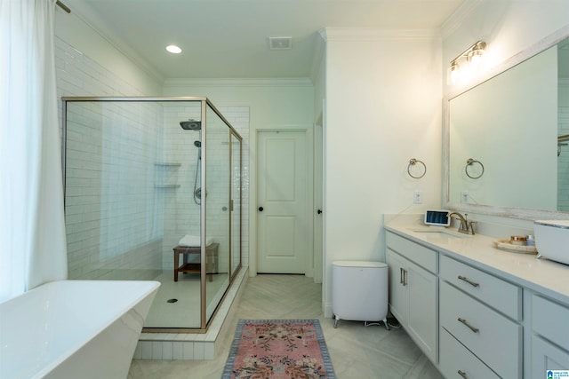 bathroom with tile patterned floors, vanity, ornamental molding, and independent shower and bath