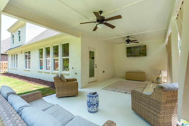 exterior space featuring an outdoor hangout area and ceiling fan