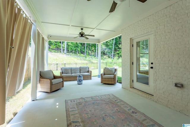 sunroom / solarium with ceiling fan