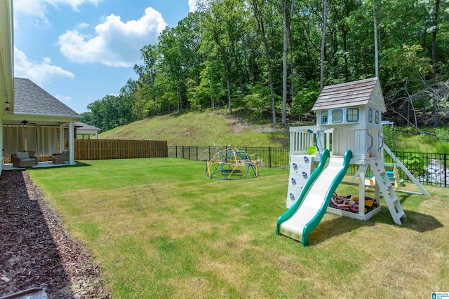 exterior space with an outdoor structure and a lawn