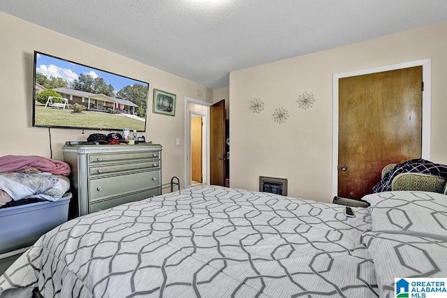 bedroom with a textured ceiling