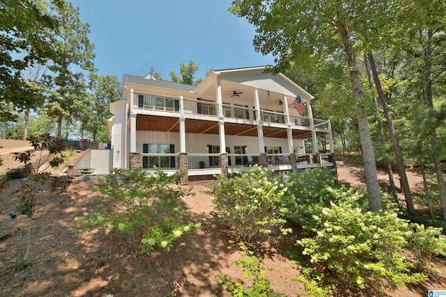 rear view of house with a balcony