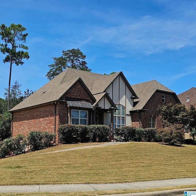 view of front of home with a front yard