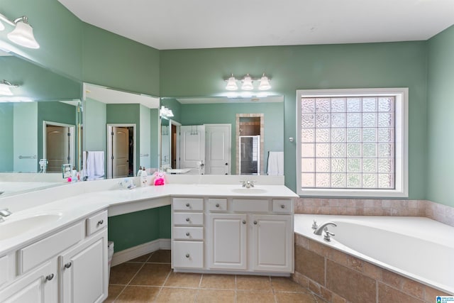 bathroom with vanity, tile patterned floors, and independent shower and bath