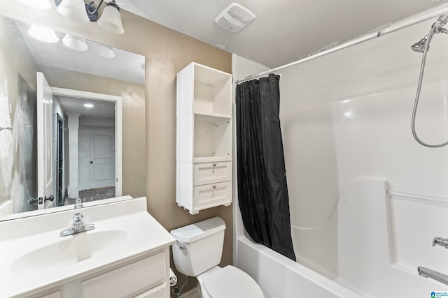 full bathroom featuring toilet, shower / bathtub combination with curtain, and vanity