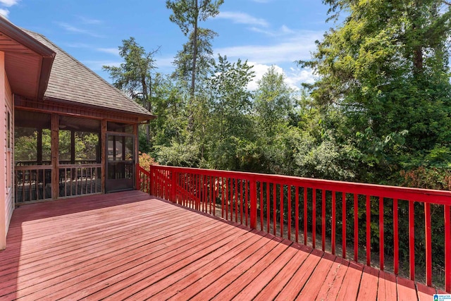 deck featuring a sunroom