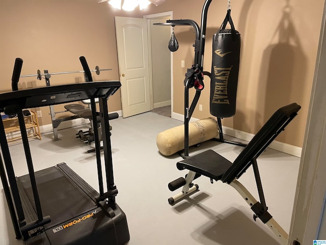 exercise area with ceiling fan