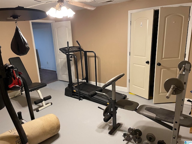 exercise room with ceiling fan