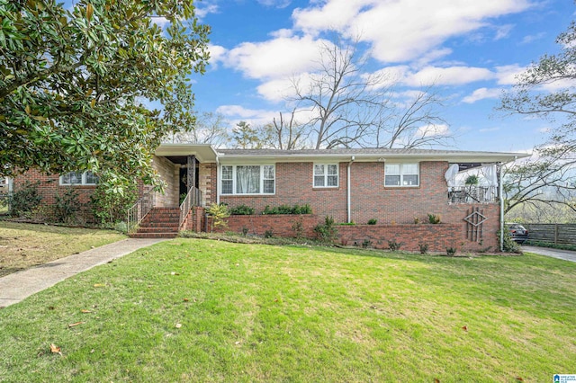 single story home featuring a front lawn