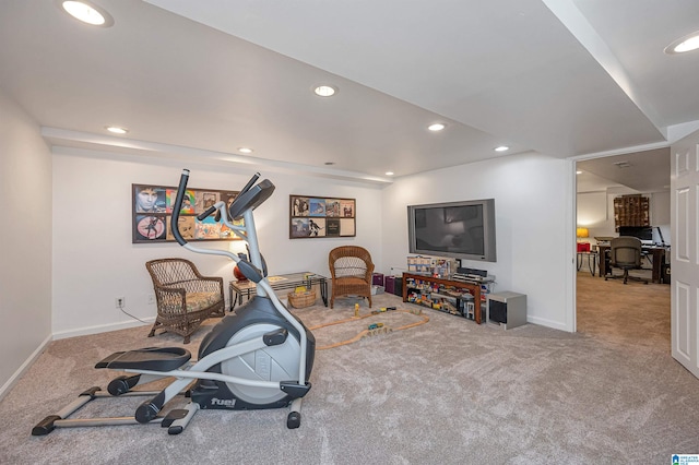 workout area featuring carpet flooring